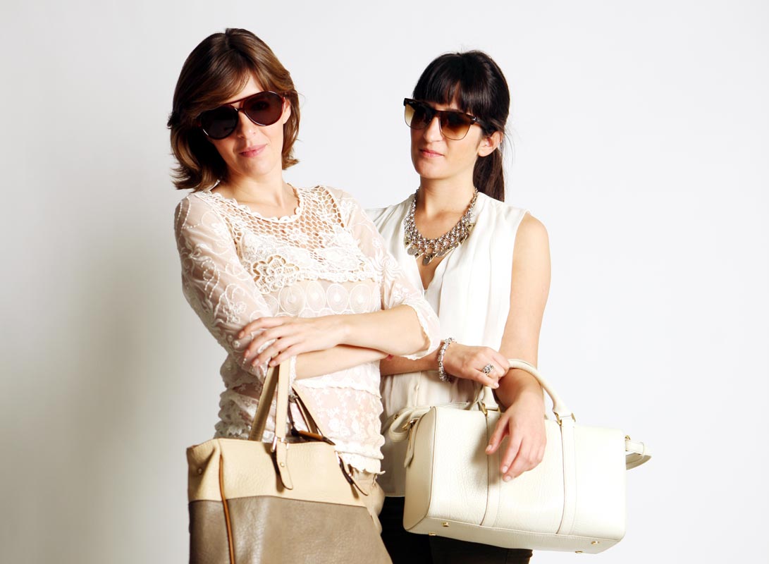 Portrait of Inês and Rita wearing sunglasses